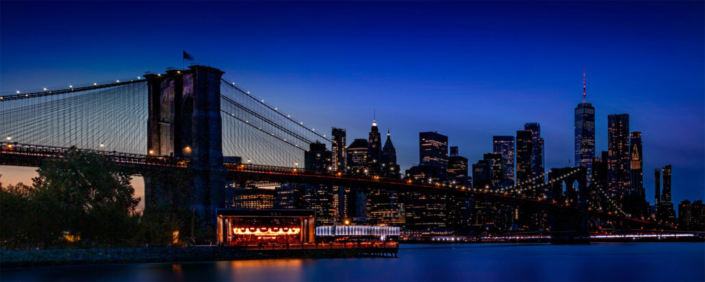 Brooklyn Bridge and lower Manhattan at dusk